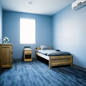 STR Behavioral Health Silver Pines: Interior photo of one of our bedrooms at our addiction and mental health treatment center.
