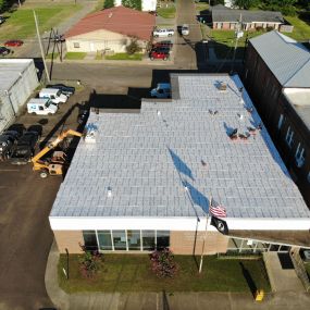 Our team working at a commercial roofing job.