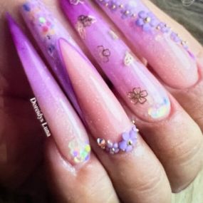Three Brothers Beauty Salon & Barber Shop - long acrylic nails in pink and purple with flowers