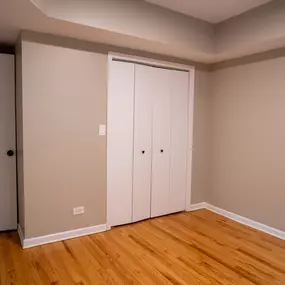 Bedroom with large closet doors