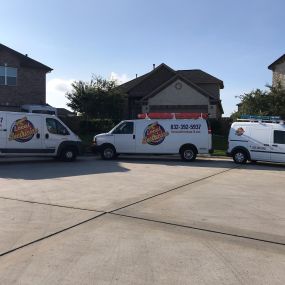 The Local Electrician Vans parked on a residential street
