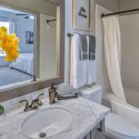 Bathroom With Bathtub at The Aster Sugar Land Apartments