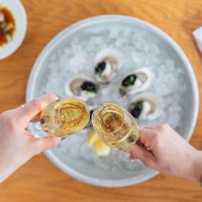 Annual Bubbles and Pearls event with all you can eat and drink oysters and  champagne