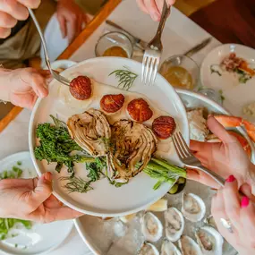 Pass a plate of fresh seafood in Boulder