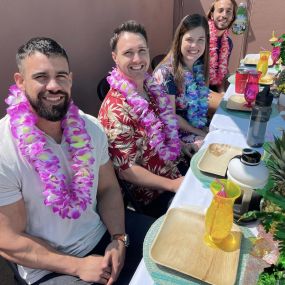 Cal Kiburz team Luau! We love team building to make sure we are our best for you!