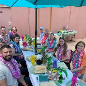 Cal Kiburz team Luau! We love team building to make sure we are our best for you!