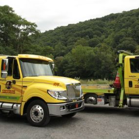Our yellow trucks are an indication that A-1 Towing Services is getting the job done!