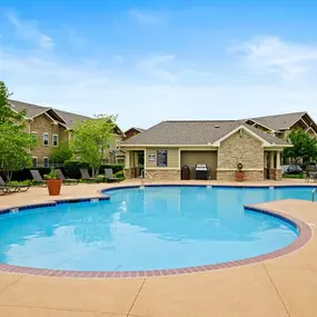 Revitalizing Pool with Relaxation Space and WiFi Hotspot Sundeck at Villas at Carrington Square Apartments