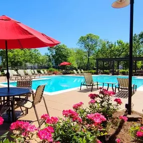 Revitalizing Pool with Relaxation Space and Seating Area at Parc 1346 Apartments