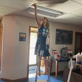 A day in the life of an insurance agent: Some days you find yourself barefoot in a dress changing light bulbs. #smallbusinessownerlife #insurance #lightbulb #funnymoments