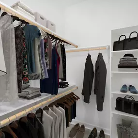 Spacious Walk-In Closets with Built-in Shelving