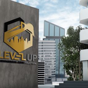 Level Up Construction logo on building