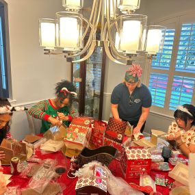 The team had a blast making and decorating gingerbread houses!