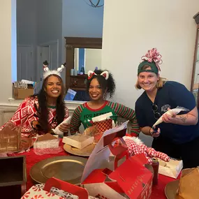 The team had a blast making and decorating gingerbread houses!