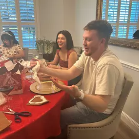 The team had a blast making and decorating gingerbread houses!