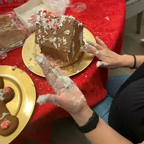 The team had a blast making and decorating gingerbread houses!