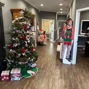 Our Christmas decor is up and even Jake is in the spirit! Come by our office to say hi and get a free insurance quote!