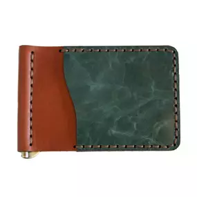 The Spring clip folding wallet is such a great choice - three card pockets (one on the front and one on each interior side) plus a spring clip for holding cash!

Available Exterior Colors: Cognac, Black, Chocolate, Natural, Rustic Wood
Available Accent Colors: Jade, Ink, Coffee, Russet, Red, Purple
Features: 3 card pockets, spring clip cash holder