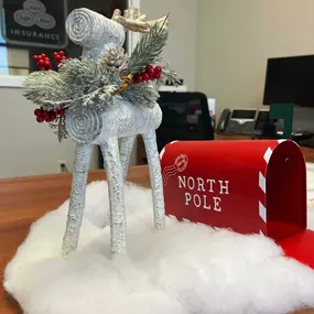 It is Christmas at Liz Sweney State Farm Office . The team has decorated the office and even set up a scrumptious hot chocolate bar  and a mailbox for your kiddos to drop off their Santa Claus Letter. We are accepting unwrapped toy for kids in need and donating them to Toys for Tots