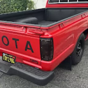 CARLITOS AUTO BODY & REPAIR SERVICE red toyota truck