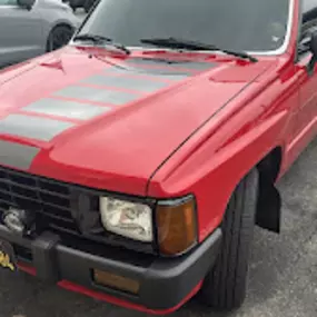 CARLITOS AUTO BODY & REPAIR SERVICE red toyota truck
