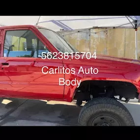 CARLITOS AUTO BODY & REPAIR SERVICE red toyota truck
