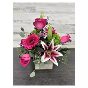 Putting a bright start in somebody’s day starts with a smile. Our delightfully pink arrangement is filled gerberas, lilies, roses, colorful filler flowers and gorgeous greens.