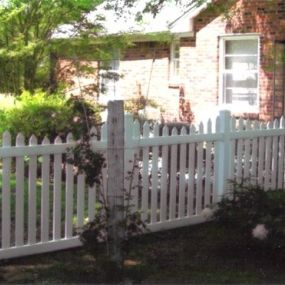 white picket fence by Pro-Line Fence Co.