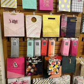 Our gift wrap has just been replenished. Lots of new cute designs!!