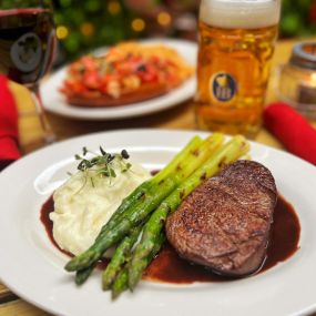 Filet Mignon with a red wine reduction, mashed potatoes and grilled asparagus