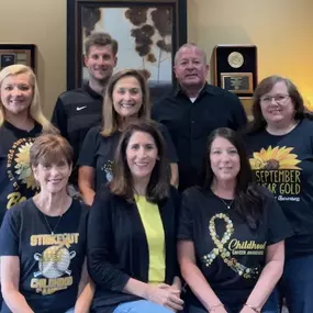 The team is wearing gold in support of childhood cancer!