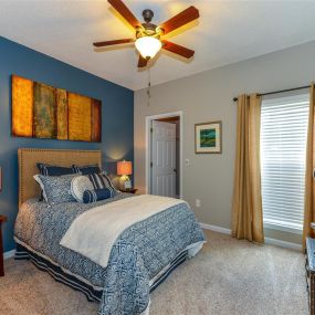 Master Bedroom Feels Large and Spacious with Impressive 9 Foot Ceilings and Large Walk-In Closets at Sugarloaf Crossing Apartments