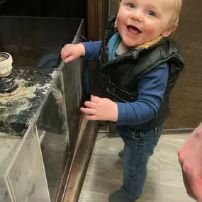 Isaac is working on getting the fish tank back up and running from our recent renovations!