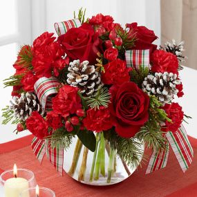 The Christmas Peace™ Bouquet brings beauty and grace to their home or holiday table with each elegant bloom.