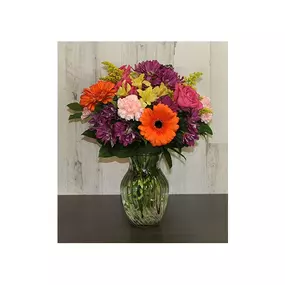 Send this Floral Jubilee to brighten someone's Day! Our florists hand-design each arrangement, so colors, varieties and vase may vary due to local availability *We strive to send the freshest flowers. That means they may arrive in bud-form.