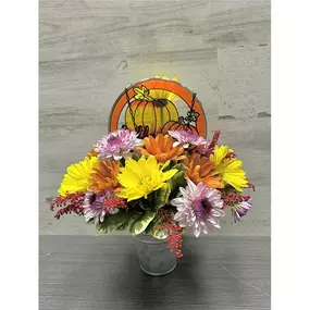 They will love this charming metal tin with fresh cut flowers and a Fall-themed suncatcher!