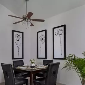 Simple dining room inside Plymouth Woods Apartments' 2-bedroom apartment for rent