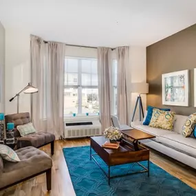 Living Room With Oversized Windows And Doors