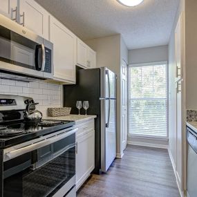 Renovated Kitchen with Subway Tile at Arbors Harbor Town, Memphis