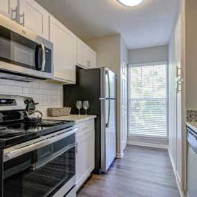 Renovated Kitchen with Subway Tile at Arbors Harbor Town