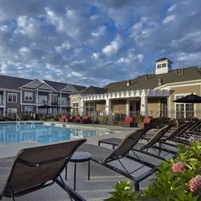 pool with sundeck and lounge chairs