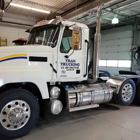 Interior view of service bay with truck