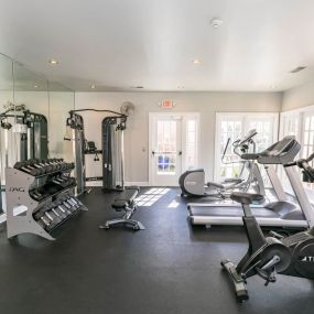Fitness center with cardio & strength training equipment.