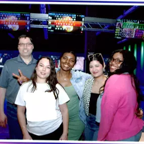 The team celebrating a good month with a friendly bowling competition!