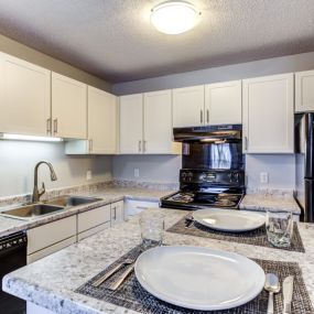 Bright Kitchen at Audenn Apartments