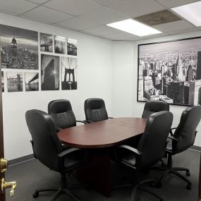 Conference room at the Peachtree Corners personal injury law office for Brauns Law, PC.