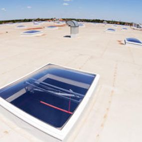 When it comes time to replace your commercial flat roofing system, there are two options available: install a new roof over the existing roofing material or tear off the existing roof and replace it entirely.