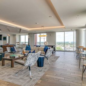 Resident clubroom with floor to ceiling windows