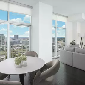 Penthouse dining and living room with views of the Gulch at Camden Music Row apartments in Nashville, TN