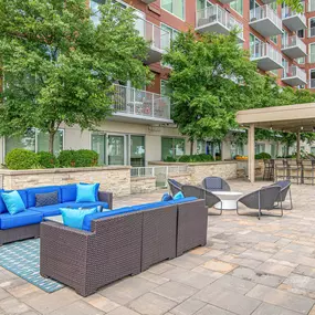 Poolside lounge and covered outdoor kitchen